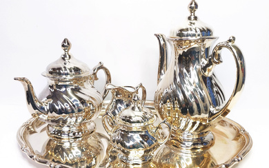 ELEGANCE IN PORCELAIN: THOMAS PORCELAIN - EXQUISITE SILVER-PLATED COFFEE SERVICE CENTERPIECE.