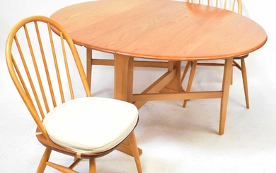 ERCOL; a light elm Windsor gateleg drop-leaf dining table, 72...