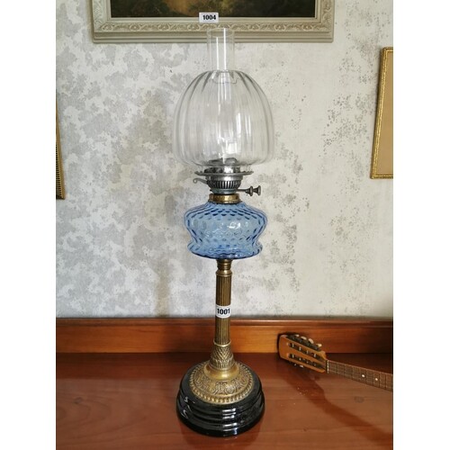 Edwardian brass column oil lamp with blue grass shade and cl...