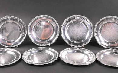 Eight English Georgian Silver Dinner Plates