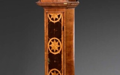 English Grandmother's Clock in veneered wooden case with turned columns on the sides, star inlays and so called "Oysterwork" in laburnum front wood, ornamental decorated silver/brass "10-Inch" dial with roman numerals, hour, minute and second...
