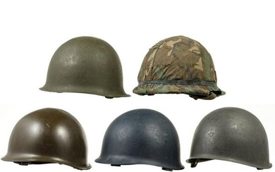 Five steel helmets of the NATO armed forces, 1950s
