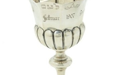 GERMAN SILVER FESTIVAL GOBLET. On round base with knobbed...