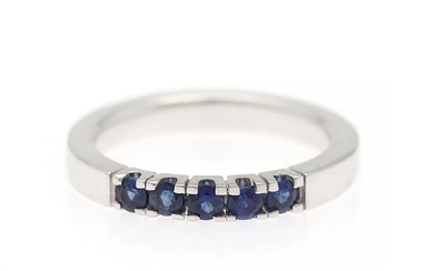 NOT SOLD. Hartmann's: A sapphire ring set with numerous circular-cut sapphires weighing a total of...
