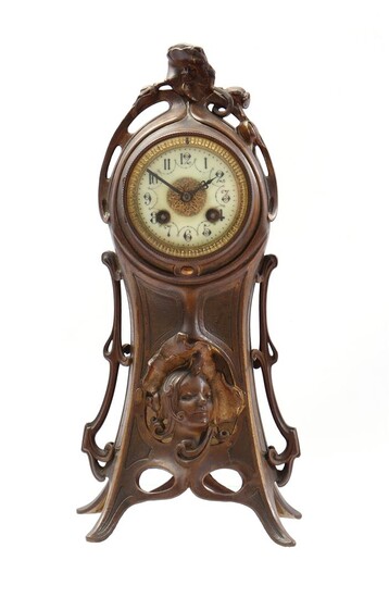 (-), Jugendstil table clock in bronze-coloured metal case,...