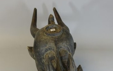 Kponiougo SENOUFO buffalo mask in patinated wood.
