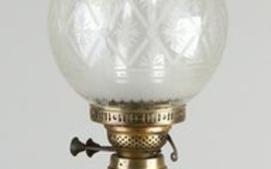 Large antique brass kerosene lamp with ceramic base and