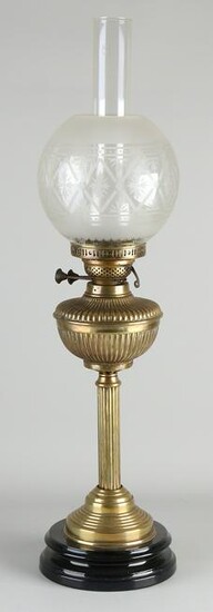 Large antique brass kerosene lamp with ceramic base and