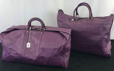 Two Carlos Falchi Purple Buffalo Leather Travel Bags