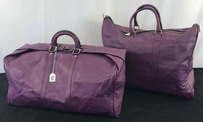 Two Carlos Falchi Purple Buffalo Leather Travel Bags