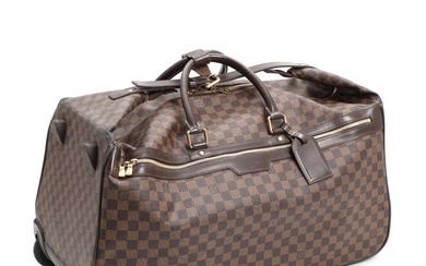 Louis Vuitton “Eole 60”. A Damier Ebene canvas trolley/travel bag with dark...