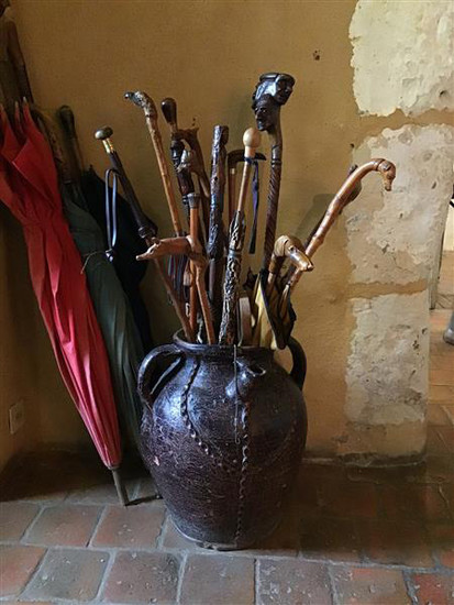 Manganese varnished oil jug, ovoid shape with three...