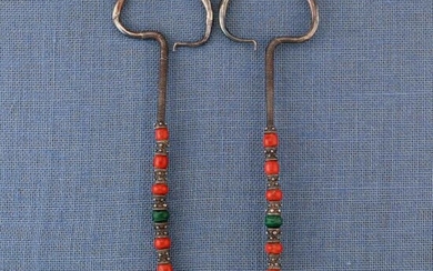 Mongolia, a pair of earrings, decorated with coral...