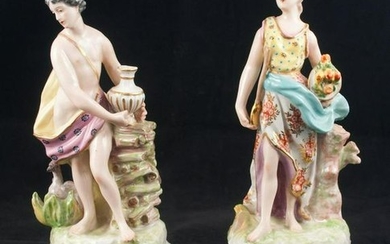 Pair Chelsea porcelain figures of a man and lady at a