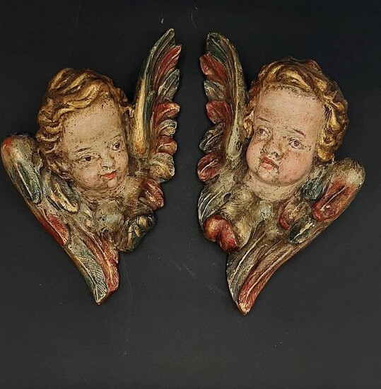 Pair of heads of winged angels - Carved and polychrome wood - 19th century