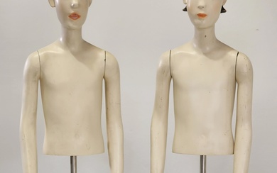 Pair of modern stylised children's mannequins, with articulated arms (h:91...