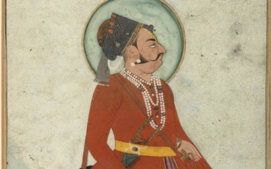 [Persian miniatures]. (Seated nobleman on a terrace, holding a flower...