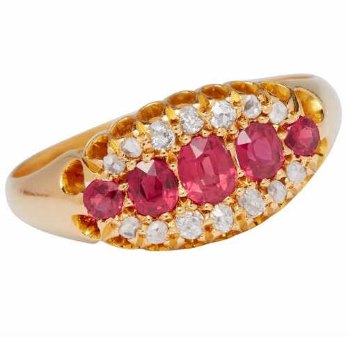 RUBY AND DIAMOND CLSUTER RING, in 18 ct. gold. Set with a ce...