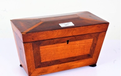 Regency mahogany tea caddy, of sarcophagus form, the inlaid hinged lid enclosing a two compartment