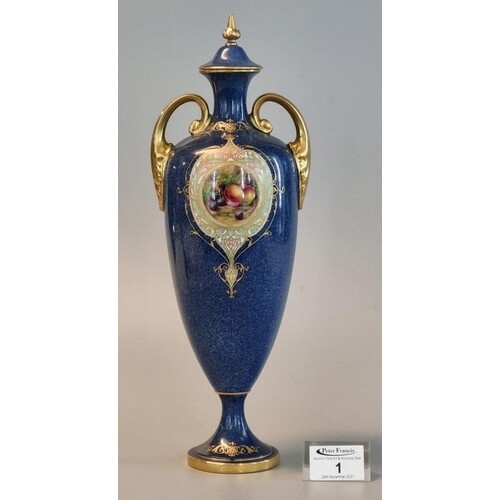 Royal Worcester porcelain two handled lidded vase on a blue ...