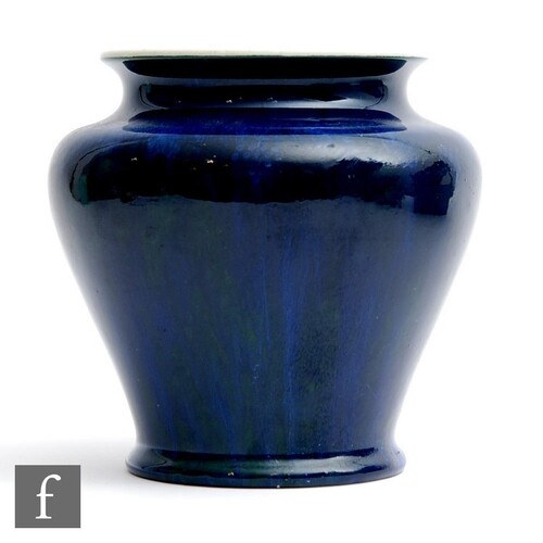 Ruskin Pottery - A souffle glazed vase of compressed form de...