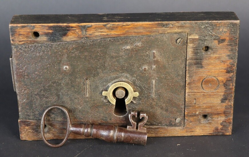 Wooden safe lock. Mechanism, metal barrel. Complete with its key. Second half of the 19th century