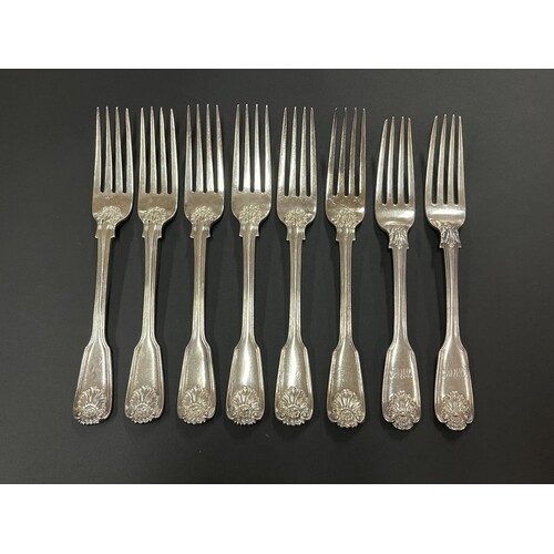 Set of eight antique English sterling silver forks, shell fi...