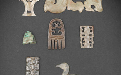 Seven early jade carvings together with a turquoise carving of a bovine beast-head