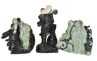 Three 20th century Oriental green hardstone carvings, two depicting...