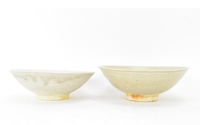 Two Chinese Song dynasty (960-1279) celadon glazed bowls, fr...