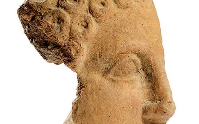 VOTIVE HEAD Southern Etruscan, 4th century BC.