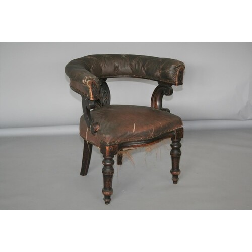Victorian mahogany library chair with curved back and deep b...