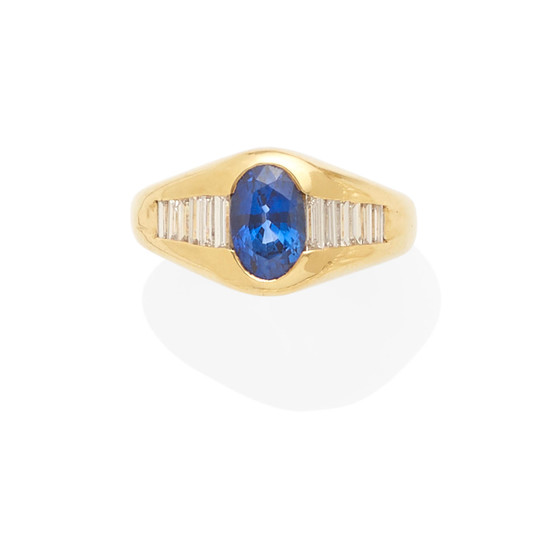a gold, sapphire and diamond ring