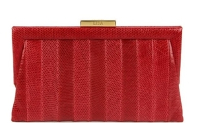 ANYA HINDMARCH - a bespoke lizard clutch. Crafted from