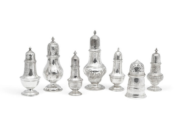 An assembled group of seven American and English sterling silver casters
