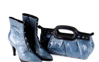 BALENCIAGA - a pair of ankle boots and a matching bag.