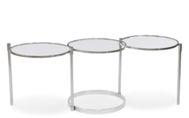 A chromed metal and glass swiveling cocktail table second...
