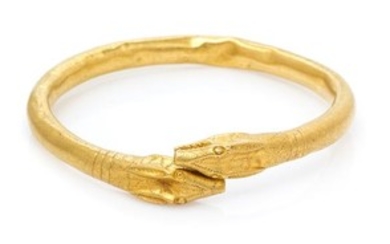 A Possibly Ancient High Karat Gold Animal Head Motif Armband