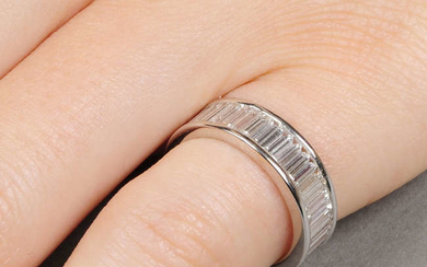 A baguette-cut diamond full eternity ring.
