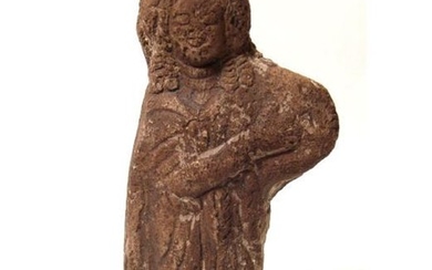 A Roman terracotta figure of a robed woman