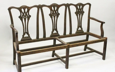 A CHIPPENDALE STYLE MAHOGANY THREE SEATER CHAIR BACK