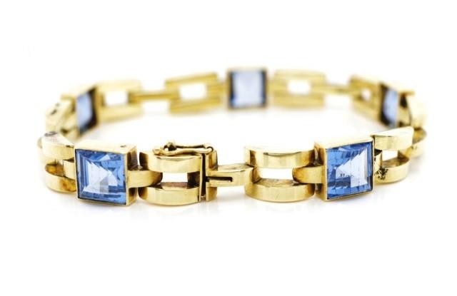 14ct yellow gold and topaz bracelet with brick links, Marked...