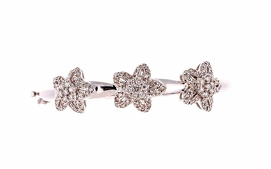 14kt gold opening rigid bracelet with flower motifs set with...