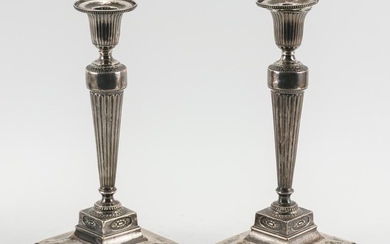PAIR OF NEOCLASSICAL GEORGE III WEIGHTED STERLING SILVER CANDLESTICKS Removable bobèches Tudor & Leader (Henry Tudor & Thomas Leader...
