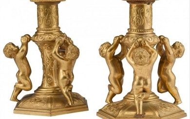 A Pair Of Continental Gilt Bronze Figural Candles