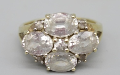 9ct yellow gold ring set with white sapphires, four oval cut...