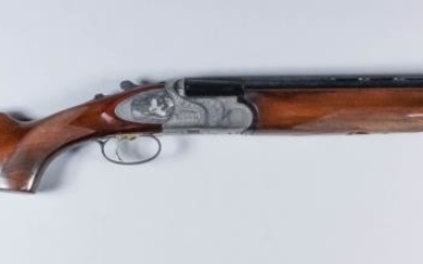 A 12 Bore Over and Under Multichoke Shotgun by...