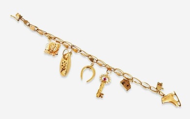 A 14K Yellow Gold Charm Bracelet
