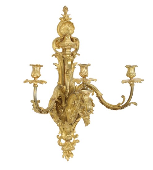 A 19th century French Louis XV style gilt bronze lamp, cast with rocailles, garlands and foliage. H. 62 cm.