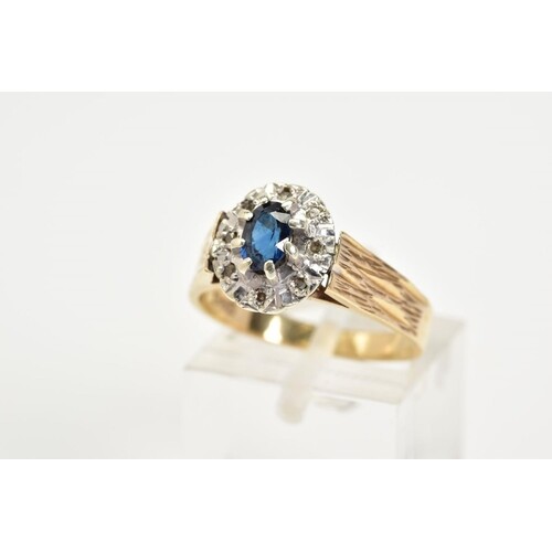 A 9CT GOLD SAPPHIRE AND DIAMOND RING, of a tiered cluster de...
